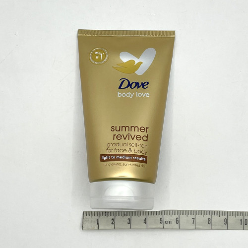 Крем лосьйон автозасмага Dove 75мл для обличчя та тіла від світлого до середнього